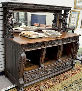 Oak sideboard with mirror back and putti shelf supports (no doors). ht. 64in., wd. 68in., dp. 27in.