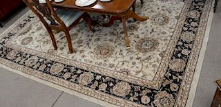 Oriental room size carpet, tan ground with black and red. 8'9" x 10'11"