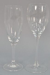Group of thirty-three stemmed crystal glasses to include 12 white wine and 21 champagne.