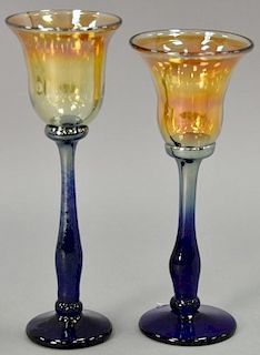 Set of thirteen Rick Strini art glass stemware, amber to cobalt with luster over glaze, signed on bottom Strini. ht. 8 3/4in.