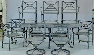 Heavy cast metal outdoor table and eight chairs, basket weave top, possibly Woodard. ht. 28in., top: 42" x 87"