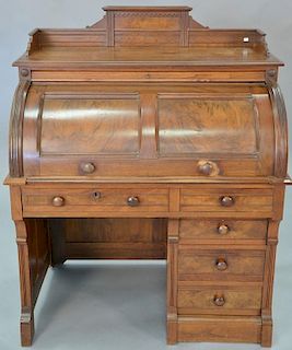 Walnut Victorian roll top desk. ht. 52in., wd. 41in., dp. 25in.  Provenance: Estate of Arthur C. Pinto, MD