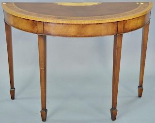 Mahogany banded inlaid demilune table. ht. 32in., wd. 45in.