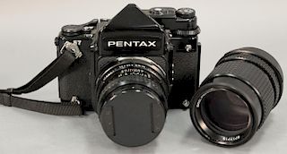 Two piece lot to include Pentax 67 outfit with 67 body, 105/2.4 lens, 165/2.8 lens, and metered finder.