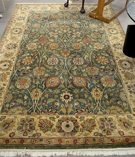 Oriental carpet, green and tan. 6' x 9'