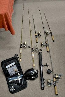 Sporting group to include six fishing reels and rods, paintball gun, and monopod fishing lures.