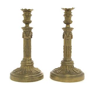 A Pair of Neoclassical Brass Candlesticks, Height 12 1/2 inches.