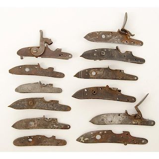 Twelve Flint or Percussion Commercial Lock Plates with Some Parts