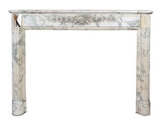 A Carved Marble Mantel, Width 63 inches.