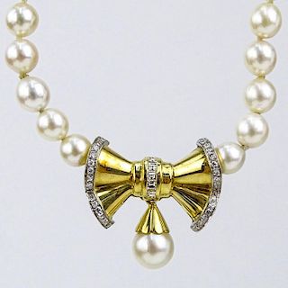 Vintage 6-8mm Pearl, Diamond and 18 Karat Yellow Gold Pendant  Necklace.