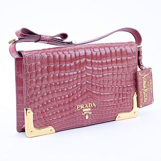 Prada Limited Edition Pink Crocodile Clutch.