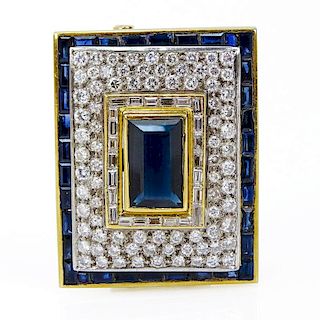 Sapphire, Diamond and 18 Karat Yellow Gold Brooch set in the Center with an Emerald Cut Sapphire