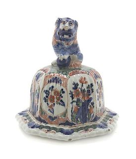 A Delft Vase and Cover, Height 26 inches.