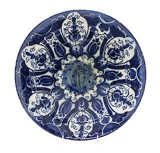 A Delft Faience Charger, Diameter 14 inches.