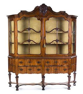 A Continental Walnut Bookcase, 19TH CENTURY AND LATER, INCORPORATING VARIOUS ELEMENTS, Height 92 1/2 x width 80 1/2 x depth 16 1