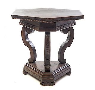 A Renaissance Revival Occasional Table, Height 26 1/2 x diameter of top 26 1/8 inches.