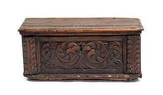 An Italian Carved Coffer, Height 14 3/4 x width 36 x depth 14 inches.