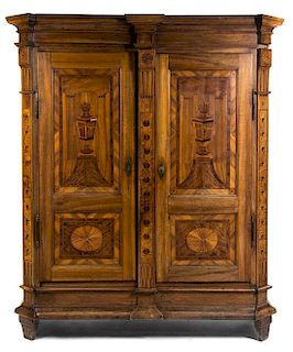 A Northern Italian Walnut and Fruitwood Marquetry Armoire, Height 89 1/2 x width 70 x depth 27 inches.