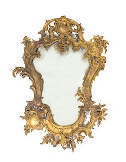 A Spanish Baroque Style Gilt Bronze Mirror, 20TH CENTURY, Height 30 x width 21 1/2 inches.