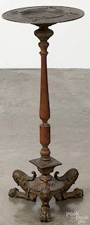 Bronze stand with a cast dish top, mask decoration, pine standard, and animal paw feet, 29 1/2'' h.,