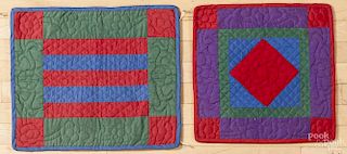 Two Pennsylvania doll quilts, mid 20th c., one in a bar pattern, the other a diamond in a square, 20