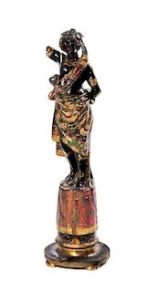 A Venetian Painted and Parcel Gilt Blackamoor, Height 41 3/8 inches.