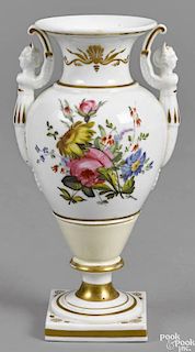 Philadelphia Tucker porcelain urn, ca. 1825, with floral decoration, gilt bands and caryatid handl