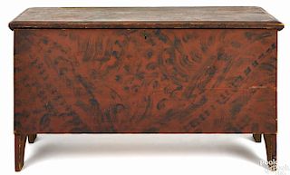 New England painted pine blanket chest, early 19th c., retaining its original red and black grain