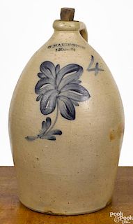 New York stoneware jug, 19th c., impressed T. Harington Lyons, with cobalt flower decoration, 17