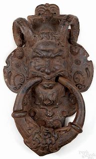 Cast iron satyr mask door knocker, 19th c., 14'' h.