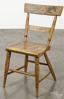 Pennsylvania painted plank seat chair, 19th c., retaining the original yellow surface with floral cr