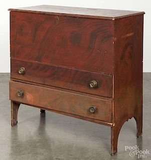 New England painted basswood blanket chest, 19th c., retaining its original red grained surface, 37''
