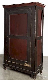Pennsylvania painted pine wardrobe, 19th c., retaining an old red and brown surface, 77 1/4'' h., 42