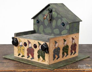 Painted pine battery operated stage, 20th c., with clowns, 10 1/2'' h., 12 1/2'' w.