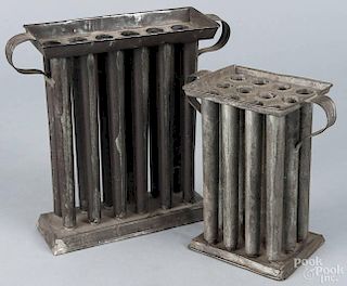Two tin twelve-hole candle molds, 19th c., 11 1/4'' h. and 9'' h.