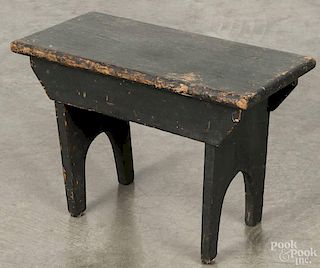 Pennsylvania painted pine foot stool, ca. 1900, retaining an old green surface, 13'' h., 19 1/4'' w.