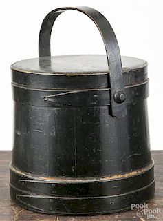 Pennsylvania painted pine firkin, 19th c., with an old dark green surface, 9'' h.