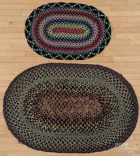 Two braided rugs, 20th c., 4' 7'' x 3' 1'' and 3' 1'' x 2' 2'', together with a rainbow runner, 14' 4'' x