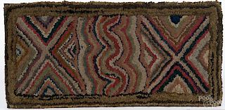 American abstract hooked rug, ca. 1900, mounted, 18'' x 36 1/2''.