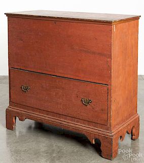 New England painted pine blanket chest, 19th c., with a single drawer, resting on tall bracket feet,