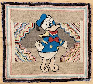 Hooked rug of Donald Duck, mid 20th c., 36'' x 39''.