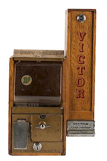 Victor Vending Corp. 1 Cent Baby Grand Oak Gumball Vendor and Card Side Vendor.