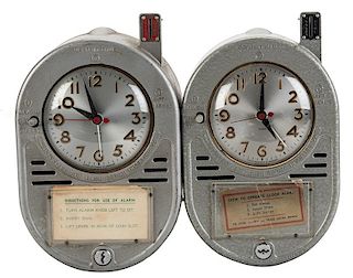 Two 10 Cent Coin Operated Hotel Alarm Clocks.