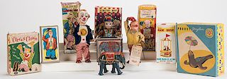 Lot of Seven Boxed Vintage Circus Toys.