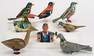 Lot of Eight Wind-Up Tin Litho Bird and Duck Toys.