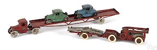 Two cast iron car carriers