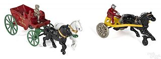 Two Kenton cast iron horse drawn toys
