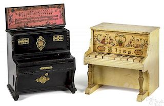 Two children's toy pianos