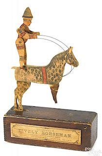 Crandall's Lively Horseman wood pull toy