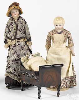 Rock & Graner painted tin crib with bisque dolls